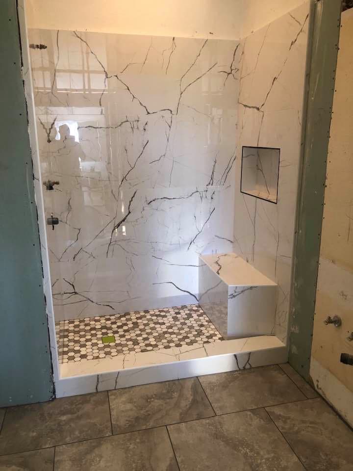 Spa-style master bathroom remodel with modern tile installation in Murrieta California