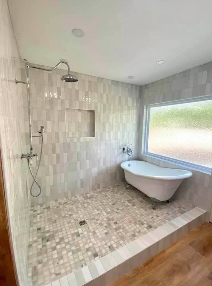 Elegant tub and shower combination tile installation in San Diego residence