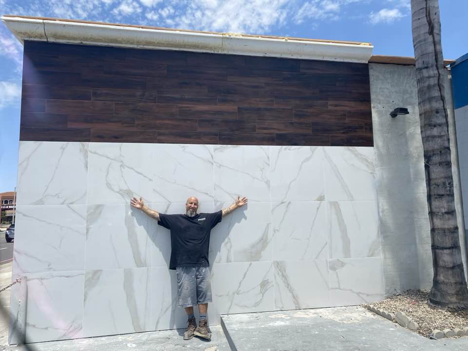 Eric installing tile